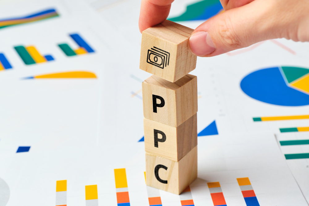 Pay per Click PPC on Wooden Blocks With Graphs.