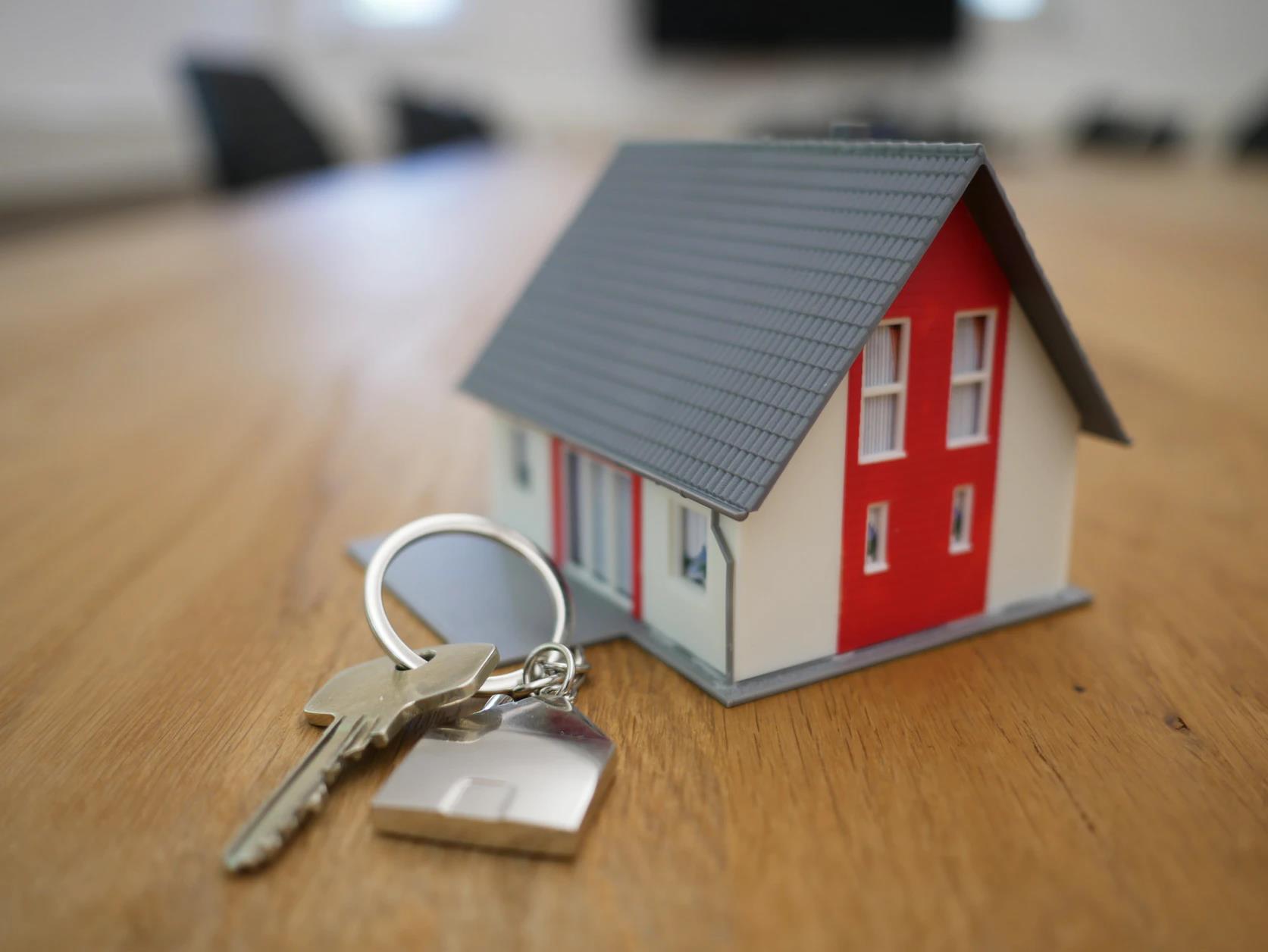 Real Estate With House Model and Keys