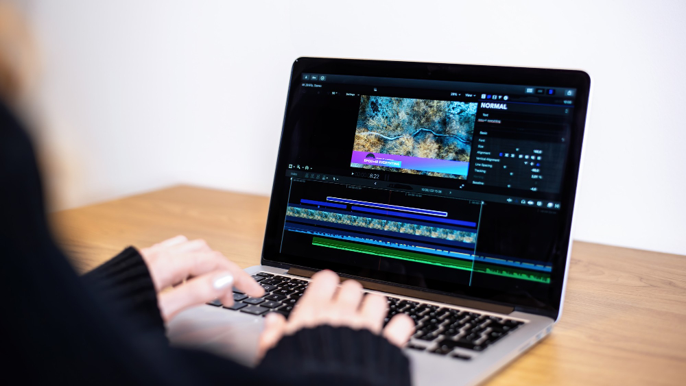 Young Content Creator Girl Editing Video on Her Laptop