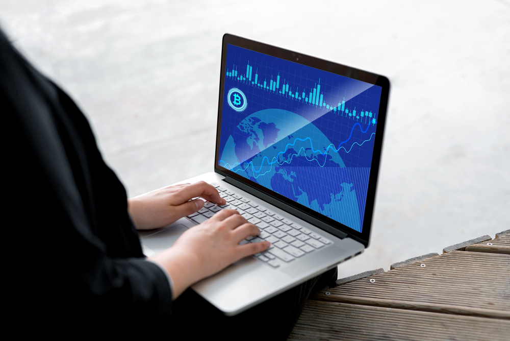 A Man Analyzing Stock Market Charts Financial Data on an Electronic Board