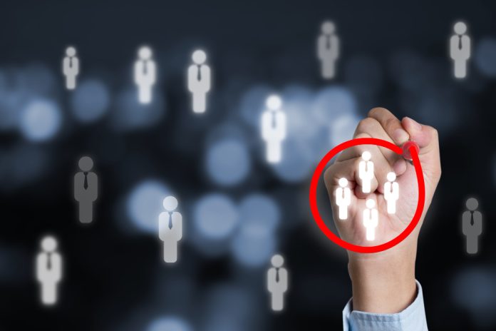 Businessman Writing Red Circle To Mark Focus Group