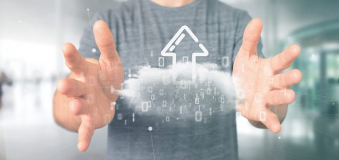 Businessman Holding a Binary Cloud With Upload Internet Arrow 3D Rendering