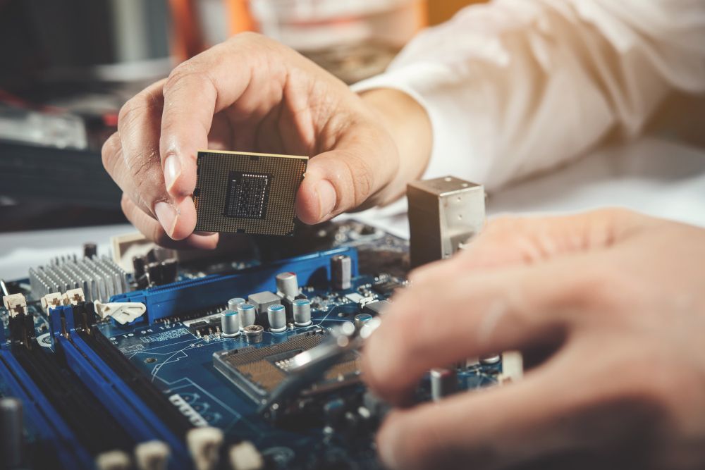 The Technician Repairing the Computer