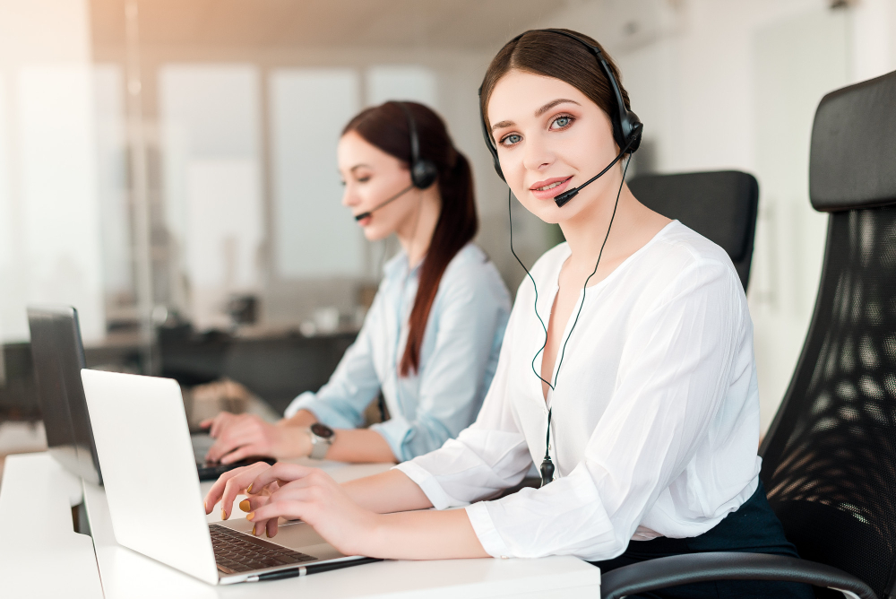 Operator in Call Center Answers Customer Requests