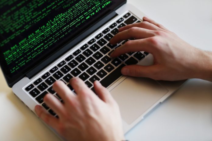 Hacker Man on Laptop