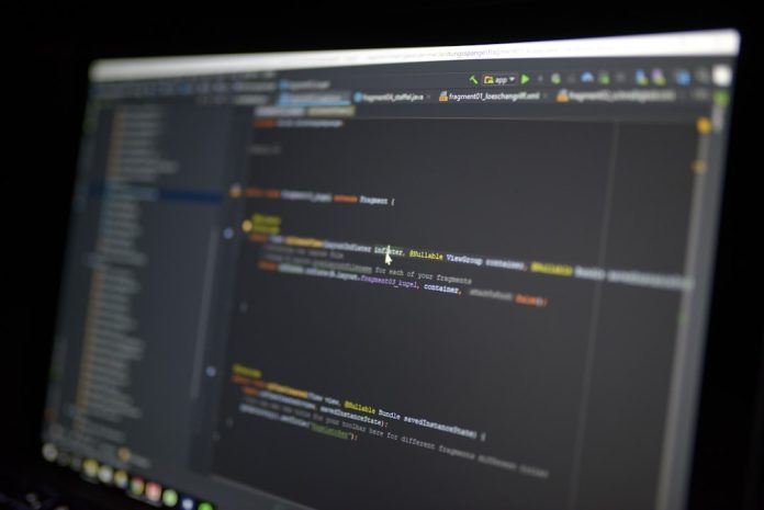 monitor showing computer application active directory, powershell, scripting tools