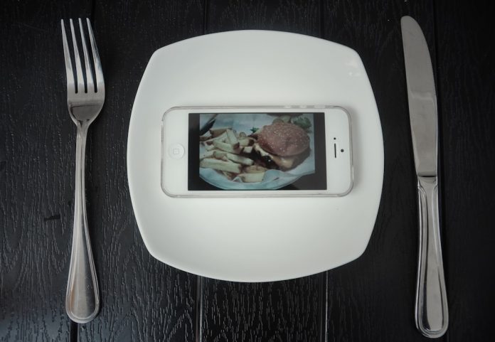 silver iPhone 5 restaurant website design, elegant menu, mobile responsive