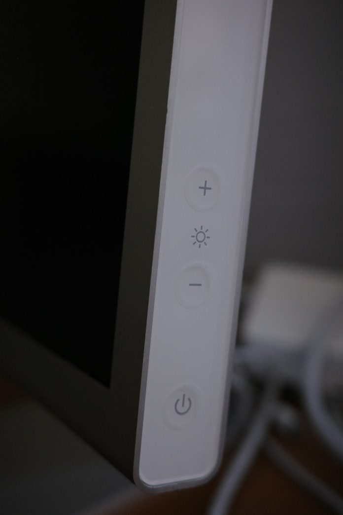 A close up of a nintendo wii controller factory reset, smart tv, settings interface