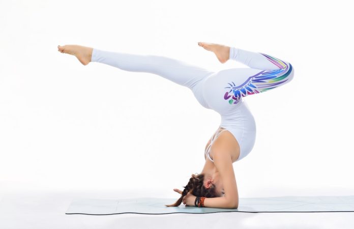 a woman jumping in the air fitness logo design, influencer branding, yoga and weights