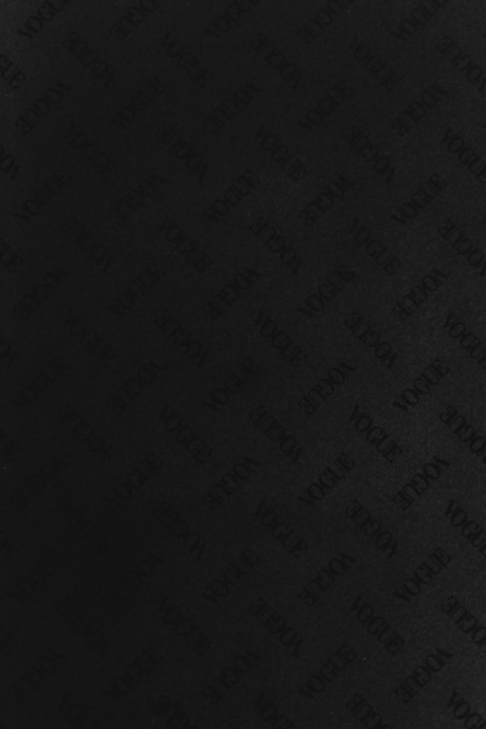 a close up of a cell phone with a black background social media branding hashtags influencer