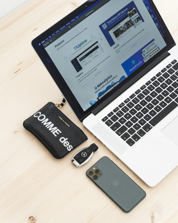 black iphone 5 beside macbook pro seo brief writing, saas tools for bloggers, content optimization platform
