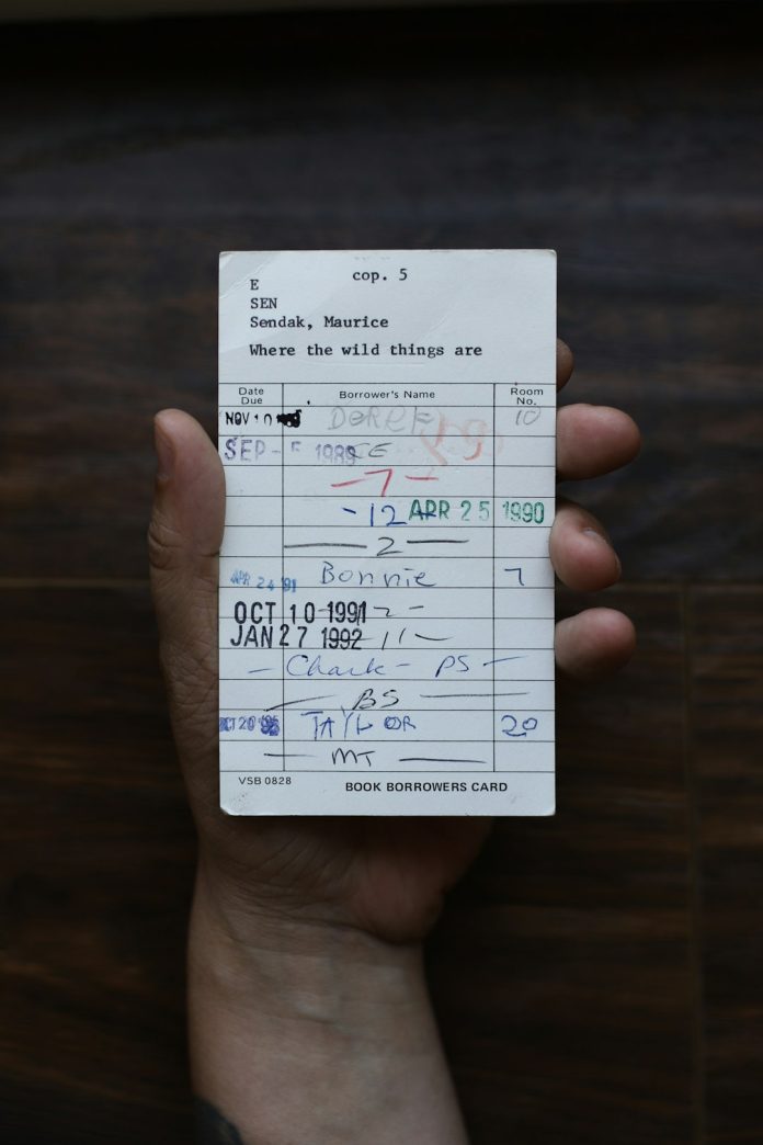 person holding white paper document invoice payment dashboard receipt