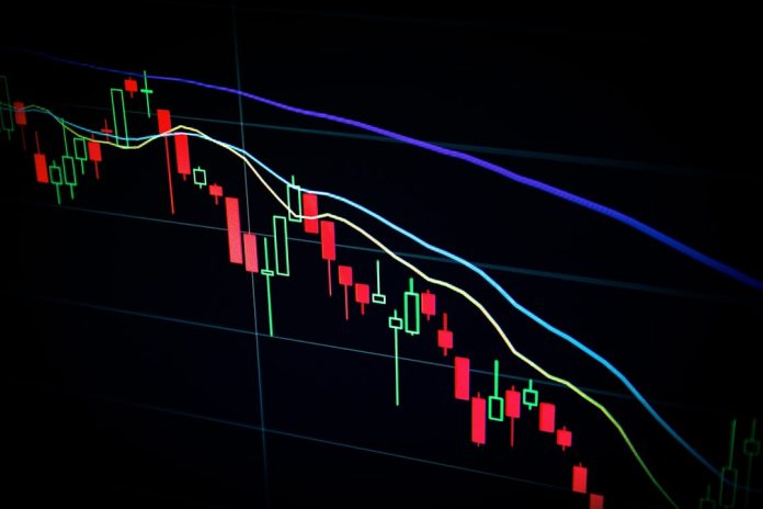 stock market candlestick chart on dark screen investment strategy, fund manager, financial charts