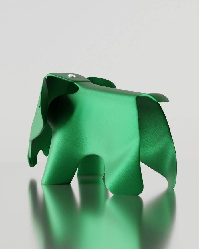 A green, shiny elephant sculpture is pictured. rhino interface, surface modeling, industrial design