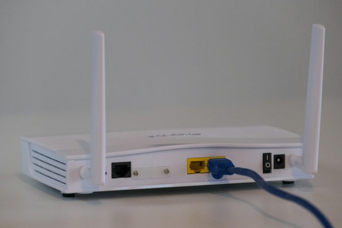 white router on white table dhcp reservation, router interface, ip address list